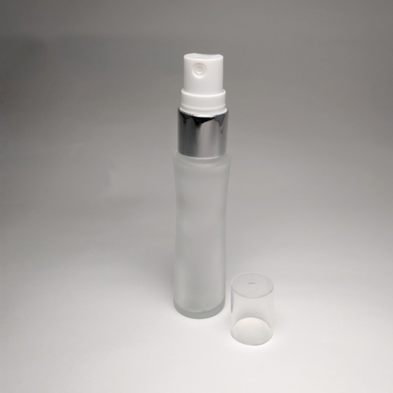 Handy design empty 25ml unique shape glass bottle with plastic electroplated silver collar for facial mist