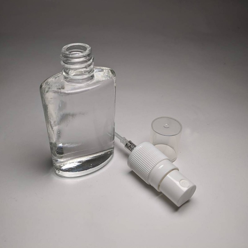 Custom spray color semi transparent glass bottle 35ml flat design bottle with white plastic mist sprayer ribbed closure 18/415 neck size