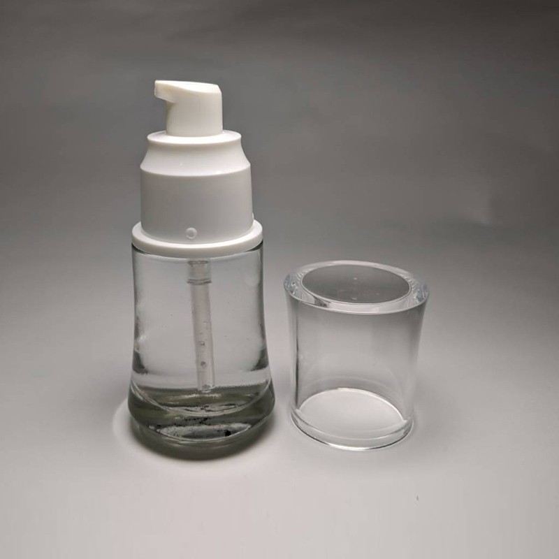 Unique shape glass bottle 30ml capacity 20/410 neck size lotion pump for foundation and skincare packaging